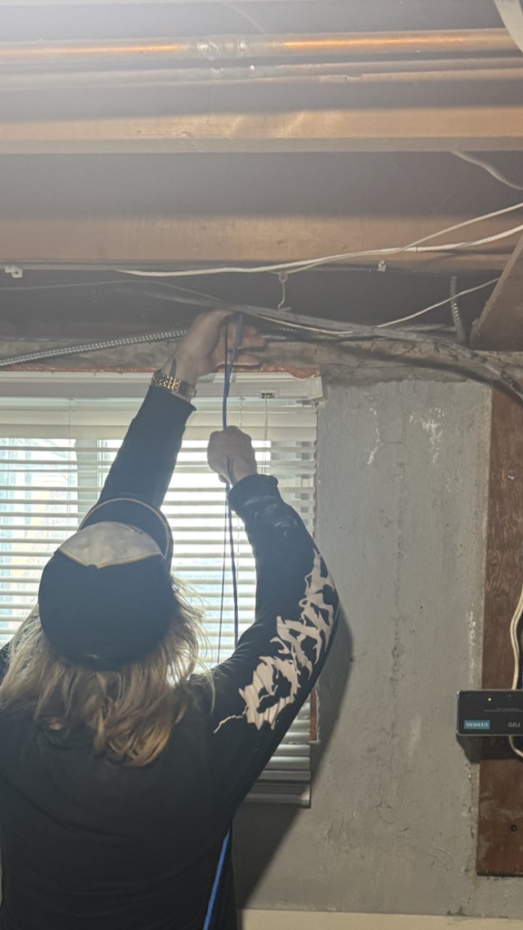 Feeding wire through the basement joist